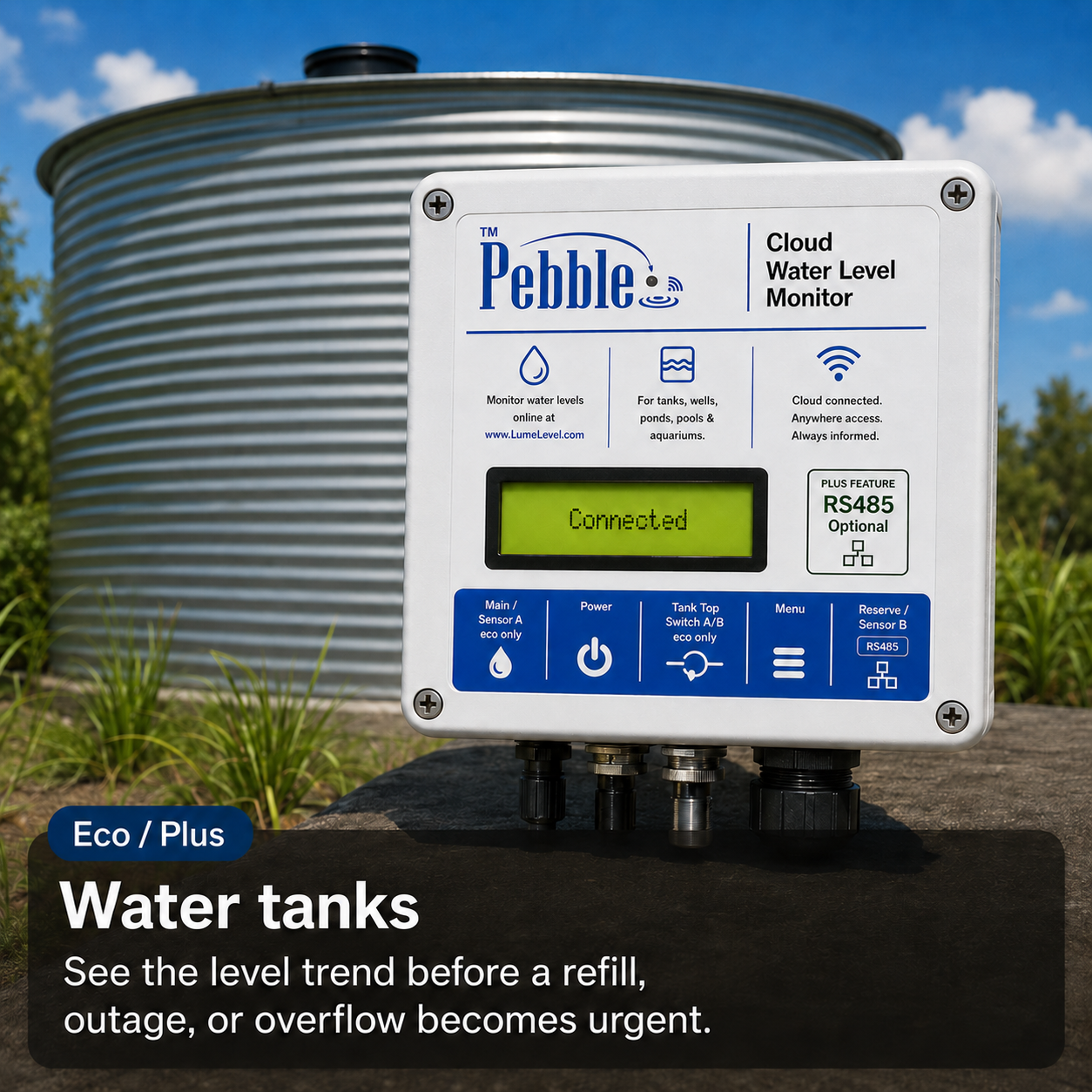 Pebble Eco and Pebble Plus water tank monitoring installation beside a large outdoor storage tank